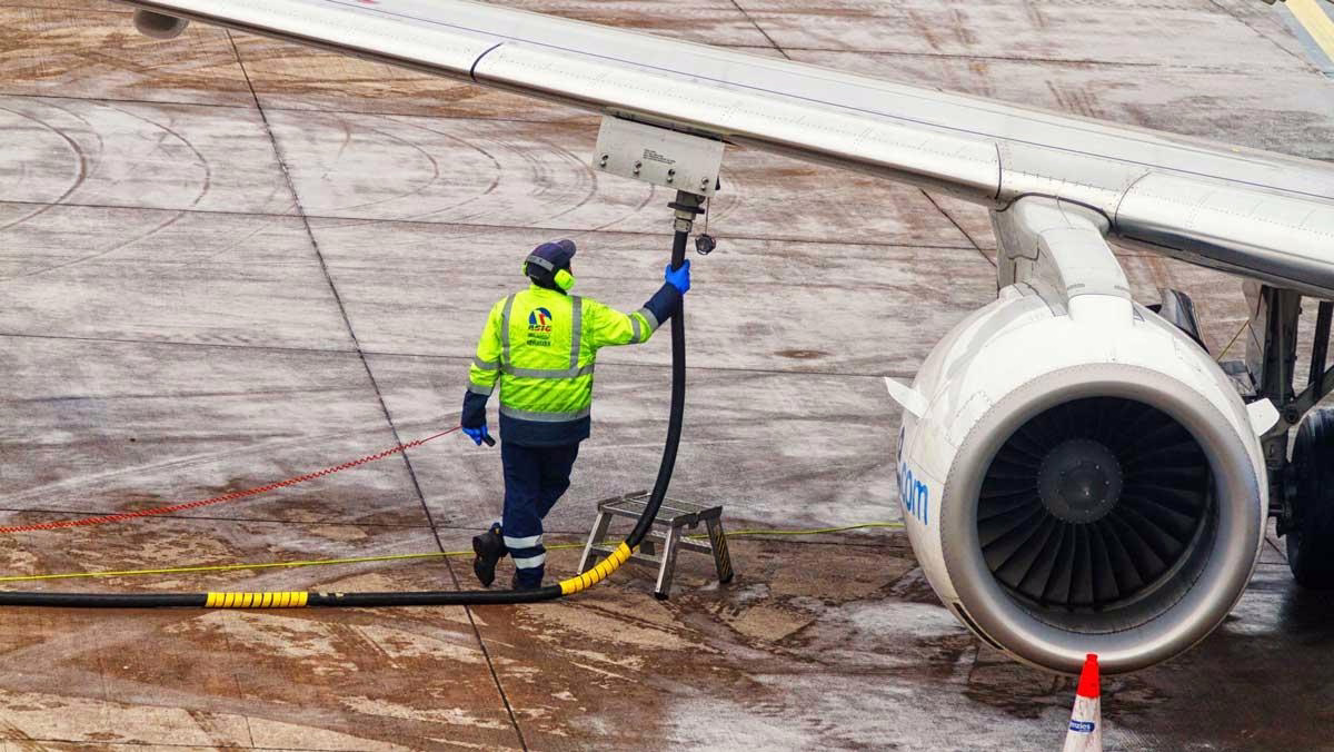 A Holistic Approach to Decarbonizing Air Transport